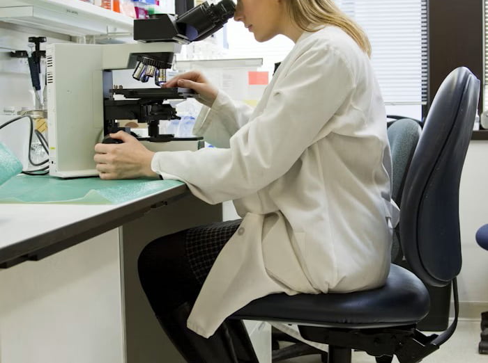 Formulation chemist working in cosmetics laboratory